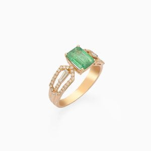 18kt Yellow Gold Diamond studded Ring with one stand out Emerald